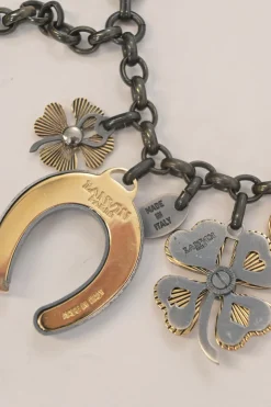 Brass and grosgrain ribbon mixed-metal lucky charm double-strand bracelet with spring clasp closure