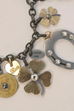 Brass and grosgrain ribbon mixed-metal lucky charm double-strand bracelet with spring clasp closure