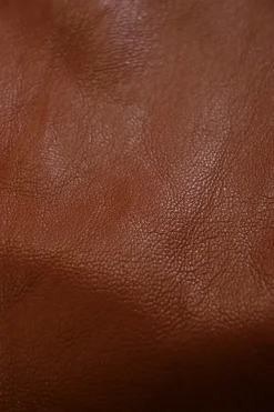 Brick brown polyester-blend faux leather high-rise shorts