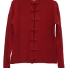 Brick red cashmere mock neck cardigan with frog button fastening at centre front