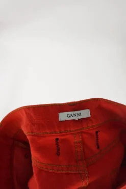Bright coral red cotton denim high-rise flared jeans