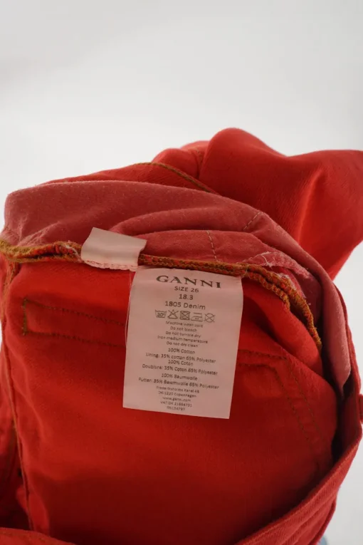 Bright coral red cotton denim high-rise flared jeans