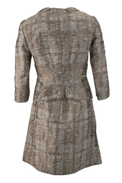 Bronze elbow length button down silk jacket with high waist mini skirt