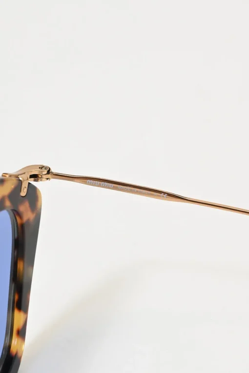 Brown acetate tortoiseshell and blue tinted polycarbonate geometric cat-eye oversized sunglasses