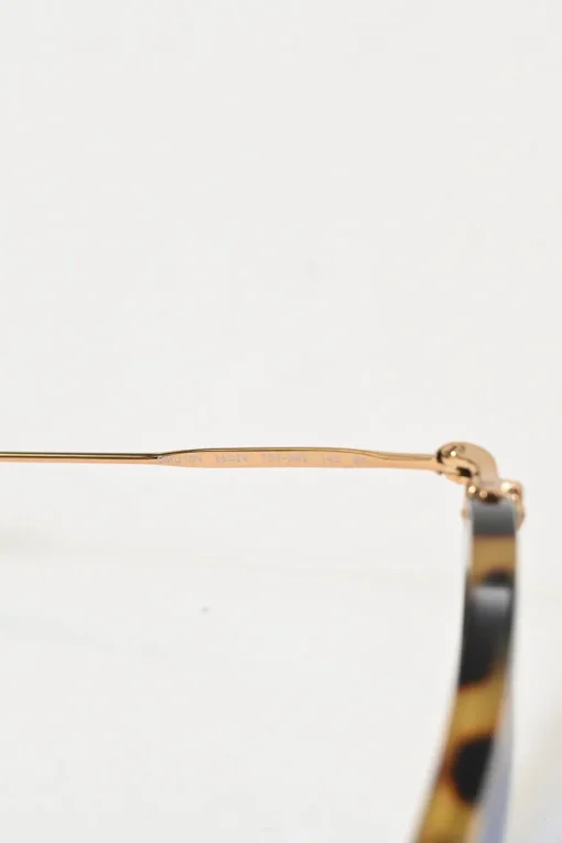Brown acetate tortoiseshell and blue tinted polycarbonate geometric cat-eye oversized sunglasses