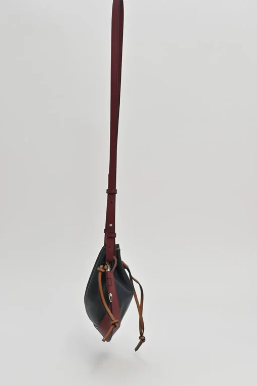 Brown and black colour-block leather horseshoe drawstring bucket bag