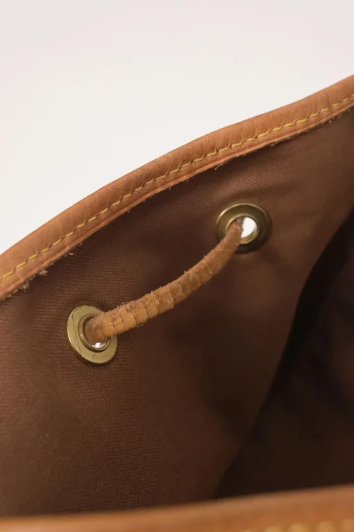 Brown coated monogram canvas and leather Montsouris drawstring backpack
