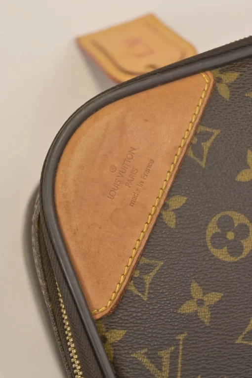 Brown coated monogram canvas and leather Pegase 60 roller