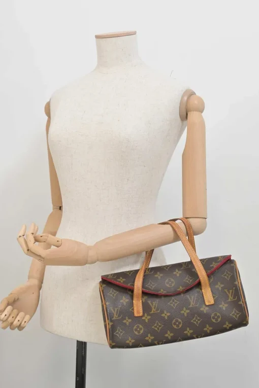 Brown coated monogram canvas and leather Sonatine bag