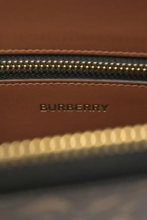 Brown coated TB monogram E-canvas and leather zip pouch