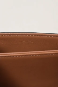 Brown coated Triomphe monogram canvas and leather Teen shoulder bag with adjustable shoulder strap