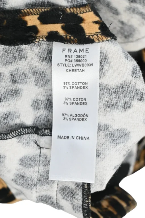 Brown cotton-spandex blend cheetah print tapered leg slacks