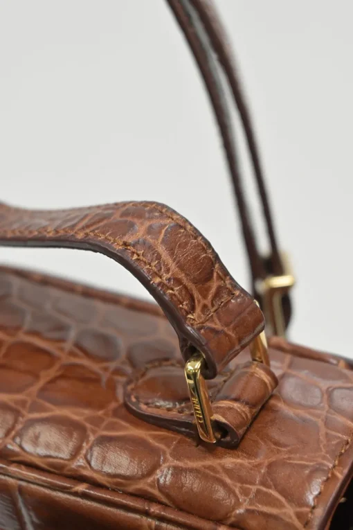 Brown croc-embossed calfskin tassel flap bag with adjustable shoulder strap
