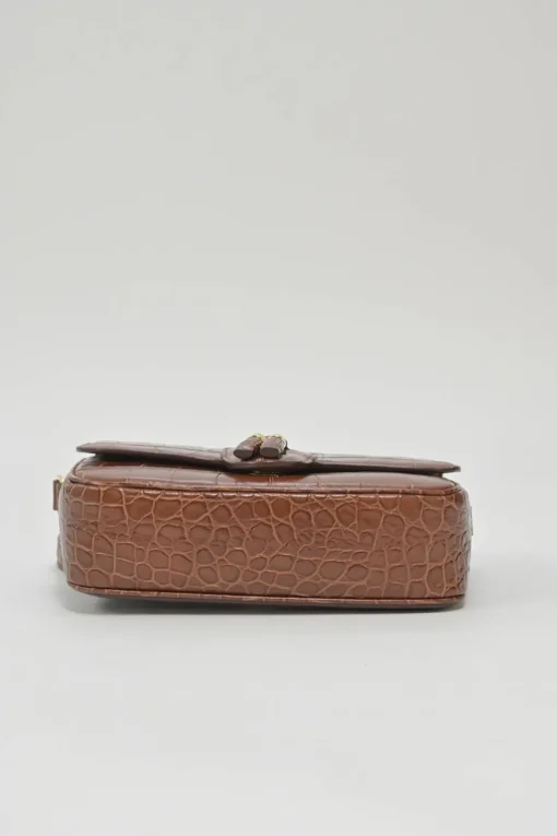 Brown croc-embossed calfskin tassel flap bag with adjustable shoulder strap