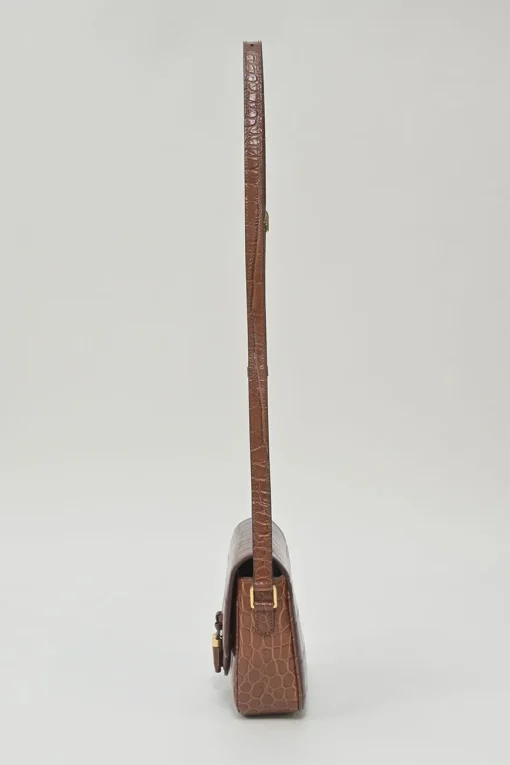 Brown croc-embossed calfskin tassel flap bag with adjustable shoulder strap