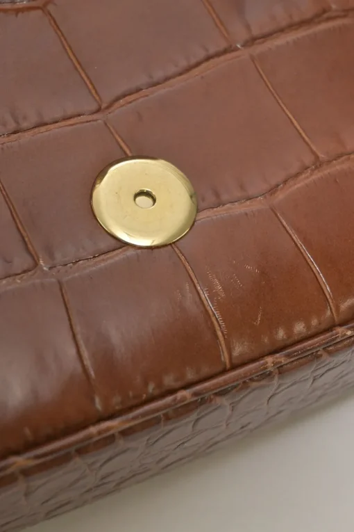 Brown croc-embossed calfskin tassel flap bag with adjustable shoulder strap