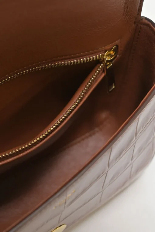 Brown croc-embossed calfskin tassel flap bag with adjustable shoulder strap