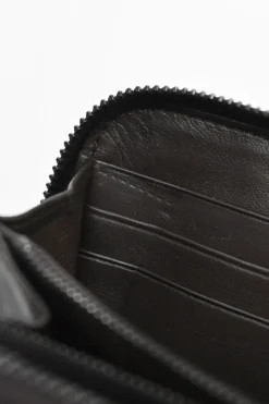 Brown crocodile skin continental zip wallet