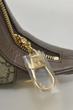 Brown GG Supreme monogram canvas and leather Ophidia mini crescent bag with webbing details