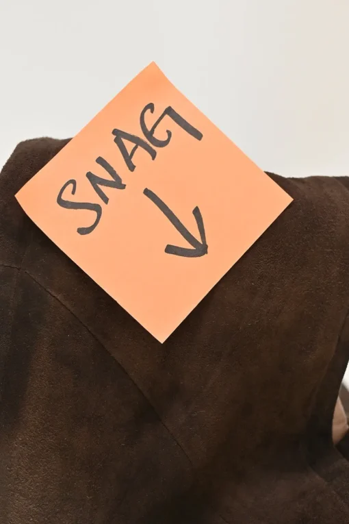 Brown lambskin suede pull-on high-rise pleated jodhpurs with with wrap-front waist adjusters