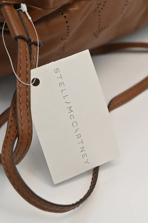 Brown laser-cut logo faux leather drawstring backpack