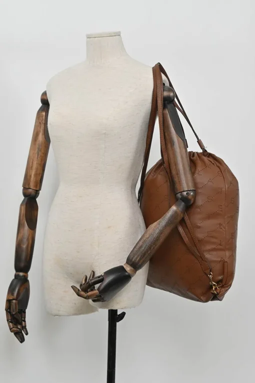 Brown laser-cut logo faux leather drawstring backpack