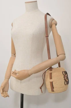Brown leather and raffia Beehive basket tote featuring anagram appliqué