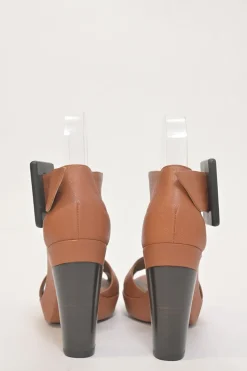 Brown leather block heel platform sandals with criss-cross vamp strap and buckle fastening