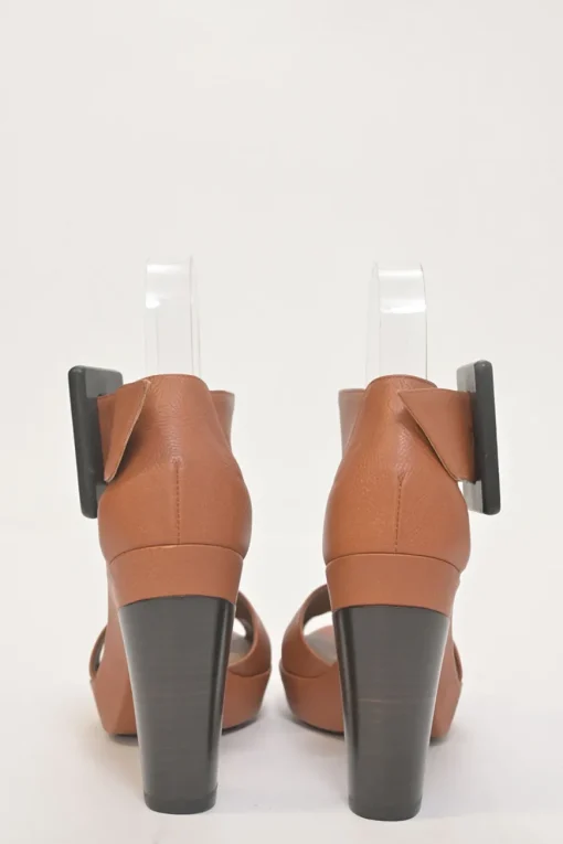 Brown leather block heel platform sandals with criss-cross vamp strap and buckle fastening