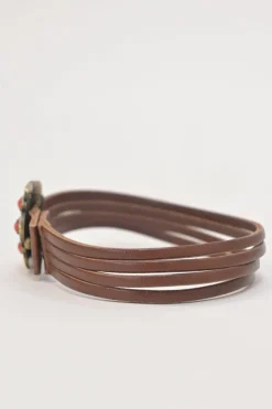 Brown leather choker featuring crystal and enamel-embellished flower pendant