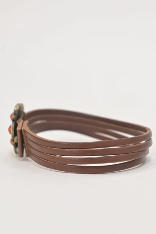 Brown leather choker featuring crystal and enamel-embellished flower pendant