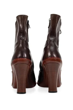 Brown leather high heel lace up pump boots with zipper fastening on the side