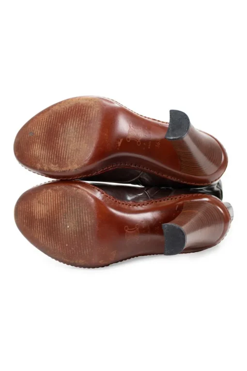 Brown leather high heel lace up pump boots with zipper fastening on the side