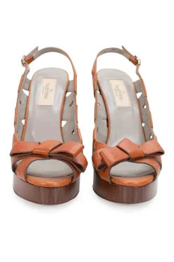 Brown leather high heeled wedge sandals with platform and open toe