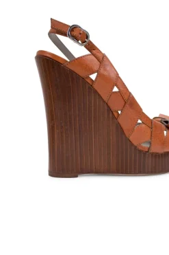 Brown leather high heeled wedge sandals with platform and open toe