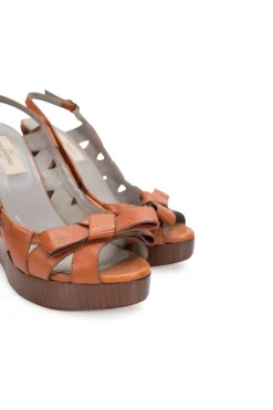 Brown leather high heeled wedge sandals with platform and open toe