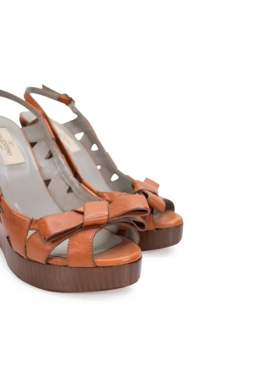 Brown leather high heeled wedge sandals with platform and open toe