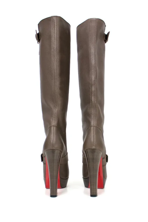 Brown leather knee high boots with chunky high heel