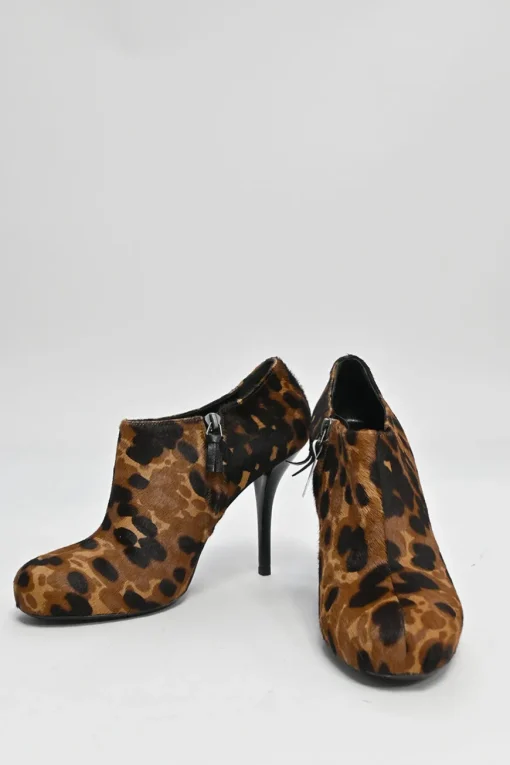 Brown leopard print calf hair and leather ankle booties with tassel zip fastening