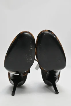Brown leopard print calf hair and leather ankle booties with tassel zip fastening