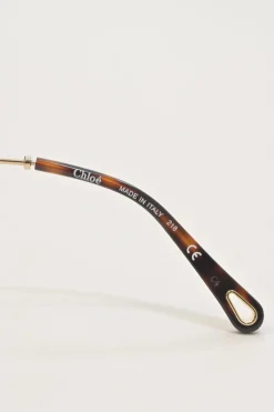 Brown metal and tinted polycarbonate heart frame sunglasses