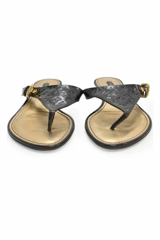 Brown monogram-embossed patent leather No Doubt buckled thong sandals
