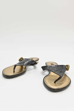 Brown monogram-embossed patent leather No Doubt buckled thong sandals