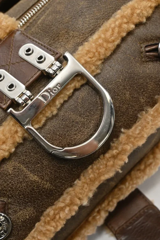 Brown mouton leather East West Flight shoulder bag with silver-tone metallic hardware