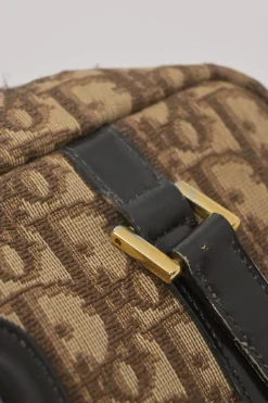 Brown Oblique jacquard canvas Trotter shoulder bag with leather straps and embossed CD patch appliqué