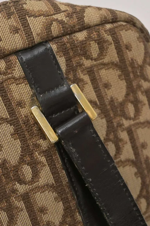 Brown Oblique jacquard canvas Trotter shoulder bag with leather straps and embossed CD patch appliqué