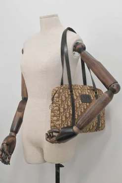 Brown Oblique jacquard canvas Trotter shoulder bag with leather straps and embossed CD patch appliqué