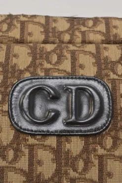 Brown Oblique jacquard canvas Trotter shoulder bag with leather straps and embossed CD patch appliqué