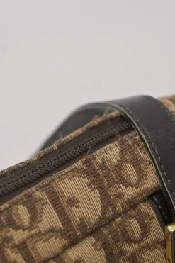 Brown Oblique jacquard canvas Trotter shoulder bag with leather straps and embossed CD patch appliqué