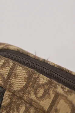Brown Oblique jacquard canvas Trotter shoulder bag with leather straps and embossed CD patch appliqué